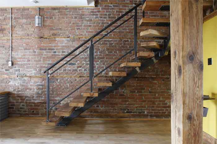 staircase with brick wall design