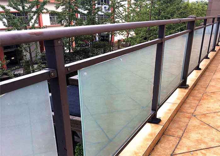 glass and iron balcony railing for house front