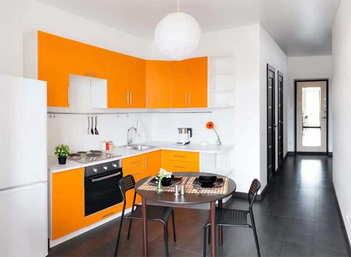small kitchen white and orange colour
