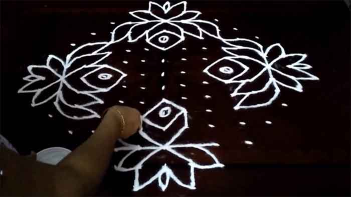 lotus rangoli design with 15 dots