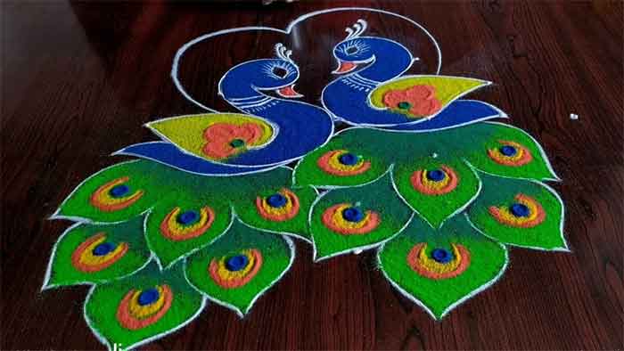 simple peacock pair rangoli design