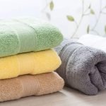 A set of one hand towel and two-three large towels