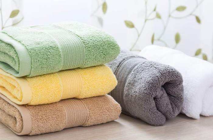 A set of one hand towel and two-three large towels