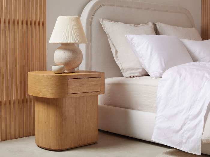 Bedside tables give space