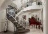 Curved Mediterranean Staircase Design with Metal Rails and Tile Finishes Curved Mediterranean Staircase Design